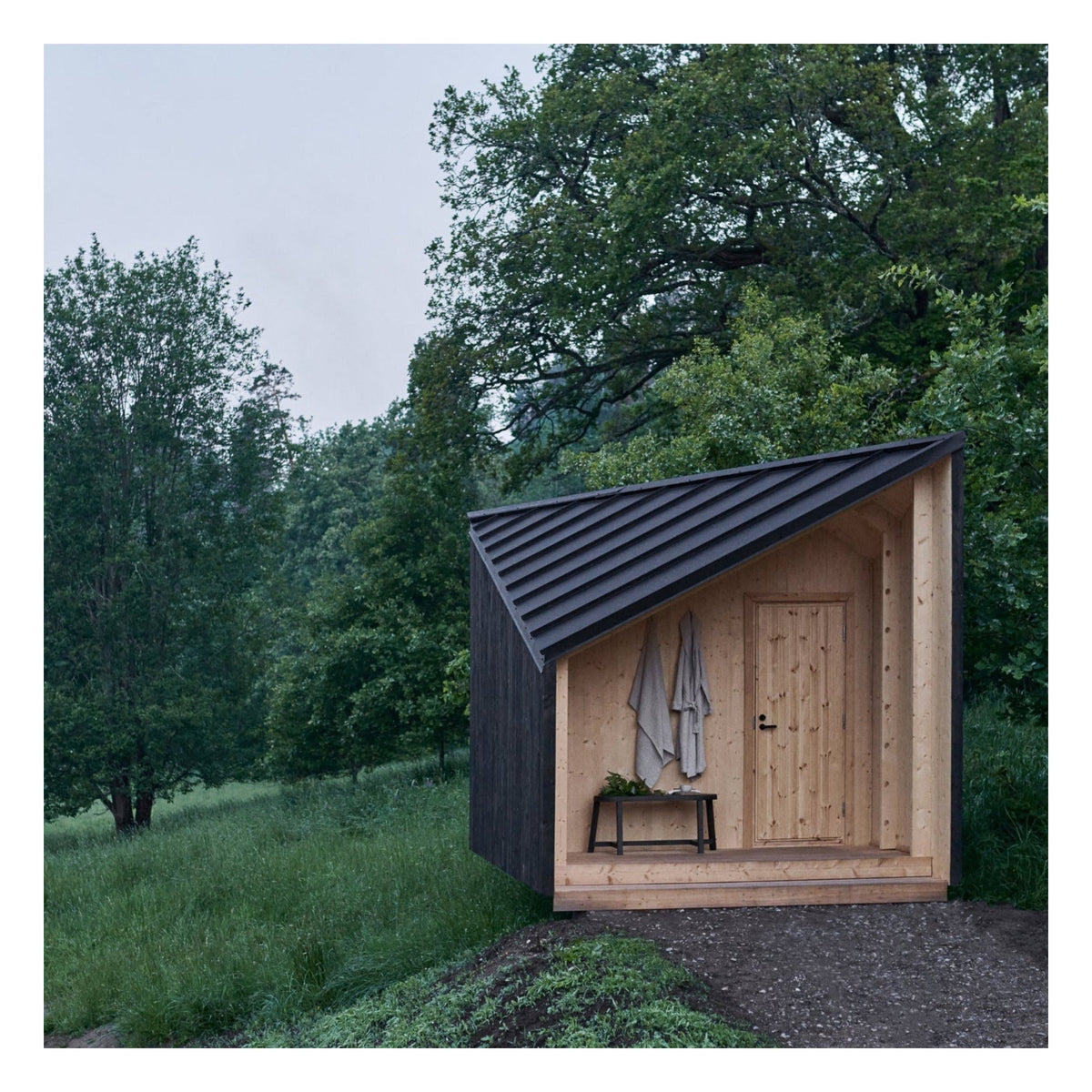 Space of Mind Designsauna - Badstugutta